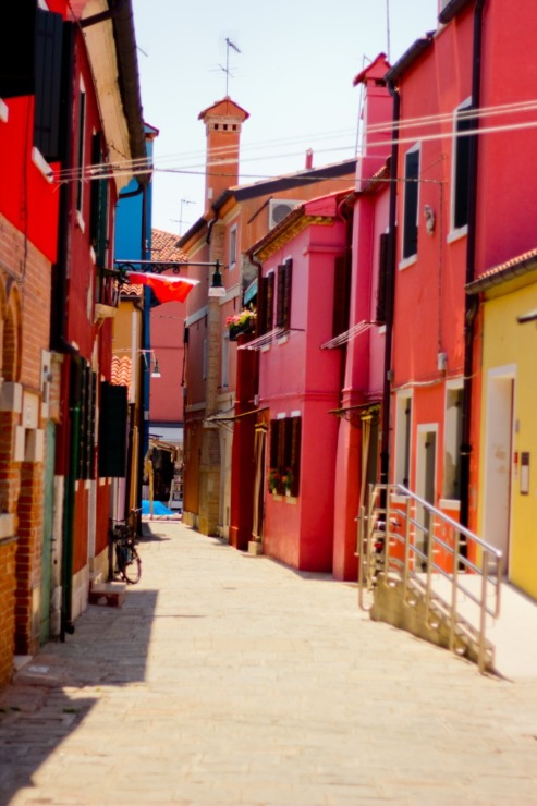 Burano red walls and bicycle