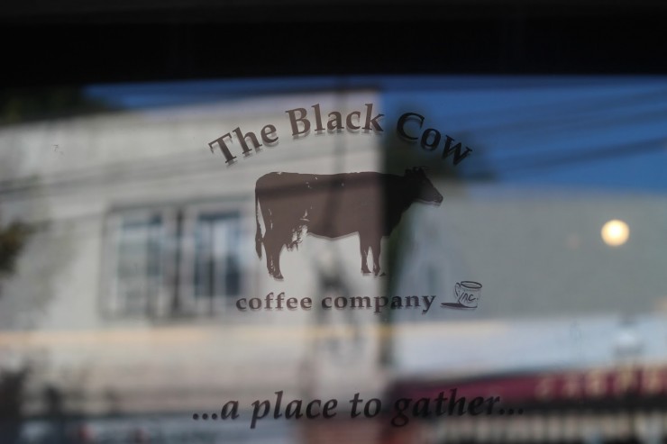 black cow coffee shop door