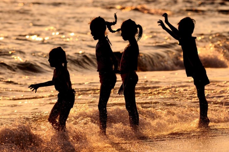 Random Acts of Poetry Day kids lined up at beach