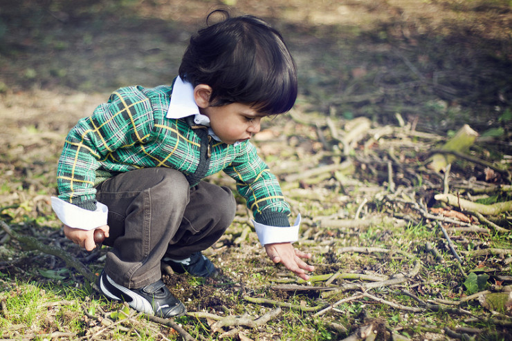 Boy kneeling Divine Emblems