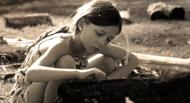 Ask Pearl girl playing with log