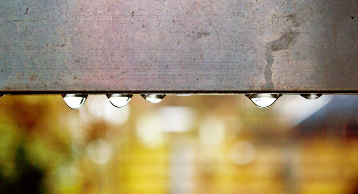 water droplets on metal beam