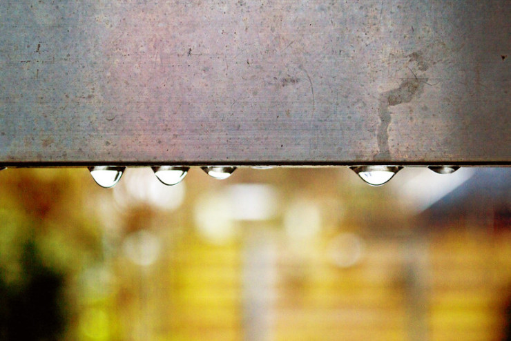 water droplets on metal beam