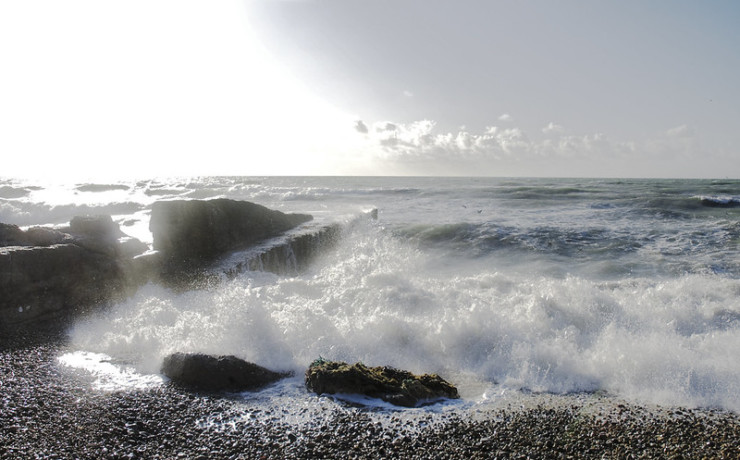 Waves crash on rocks