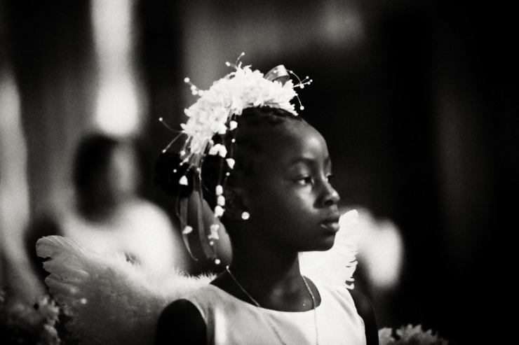 Black girl dressed as angel