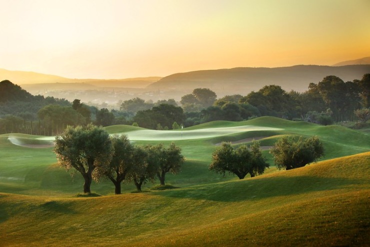 The Dunes Golf Course trees on rolling green hills