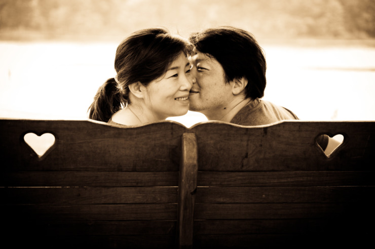 asian couple kissing