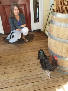 Karen Paul Holmes with chicken