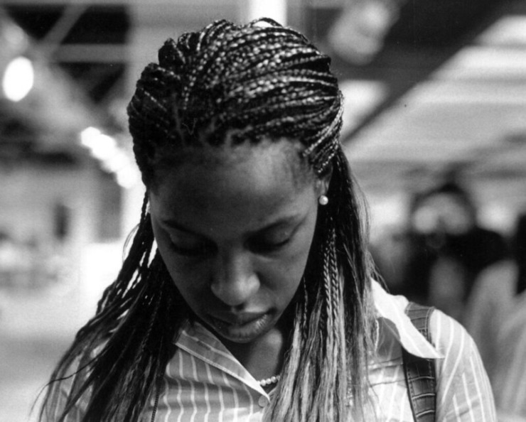 woman with braids in moonlight