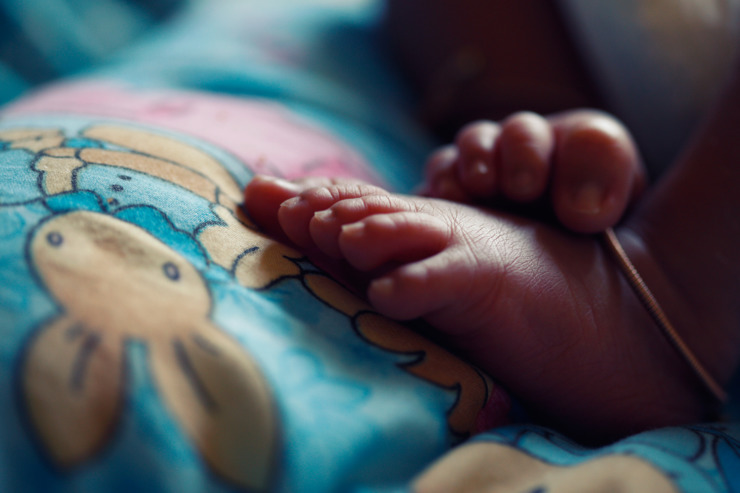 baby feet on bunny blanket