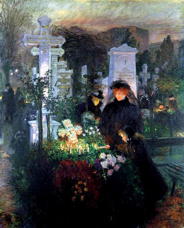 mourners at a grave covered with flowers