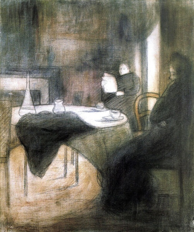 women sit in mourning around a table
